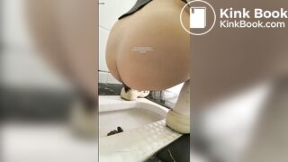 A girl defecated and urinated in a public toilet.