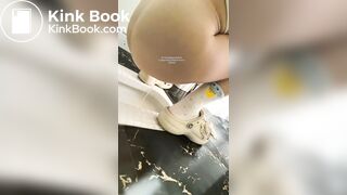 A girl defecated and urinated in a public toilet.