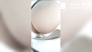 Chinese girl defecating and urinating in the toilet.