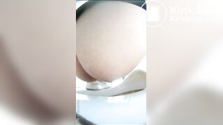 Chinese girl defecating and urinating in the toilet.