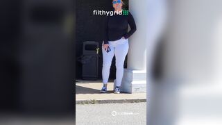 thick woma n white pants pushes out diarrhea in public