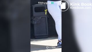 thick woma n white pants pushes out diarrhea in public