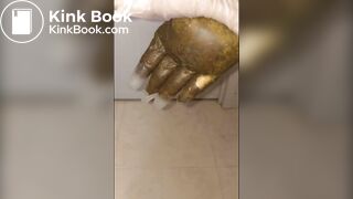 Girl puts hand into dirty glove