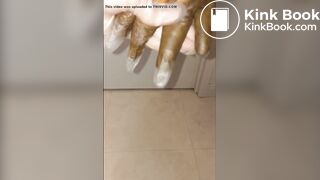 Girl puts hand into dirty glove