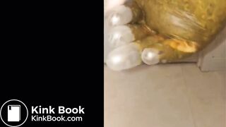 Girl puts hand into dirty glove