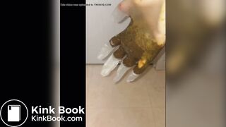 Girl puts hand into dirty glove