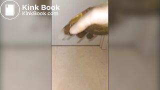 Girl puts hand into dirty glove