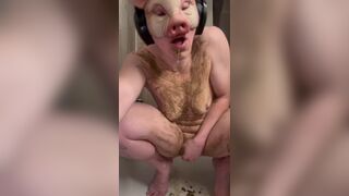 Nasty ugly cunt plays with shit