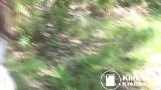 Girl pushing hard turd in forest