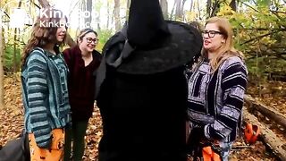 She sits in a cauldron