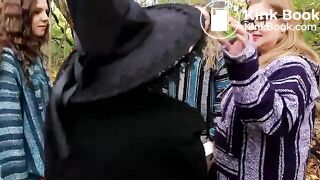 She sits in a cauldron