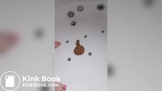 A milf is proud of her poop