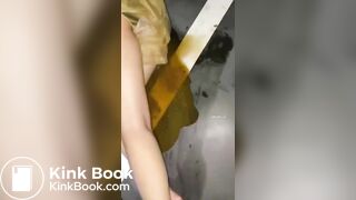 Asian girl shit in skirt.