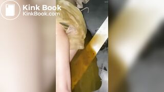 Asian girl shit in skirt.