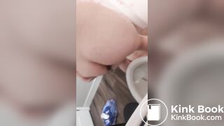 Nasty girl wipes her butt with spit and licks it