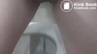 Girl hover shitting in a hospital toilet