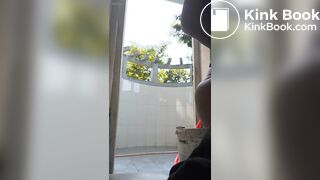 This girl forgot to close the door while pooping