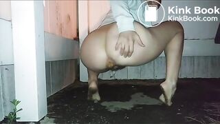 Girl poop near fence