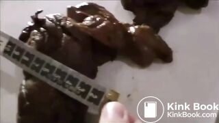 Sexy girl pooping on floor standing