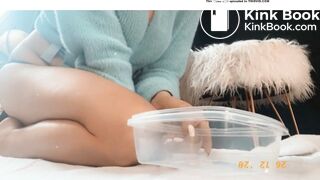 A tupper filled with her hot poop