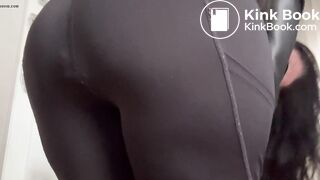 Woman poop her black leggings