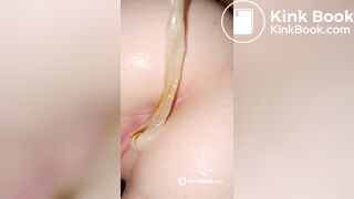pulling a shitty condom out of her ass
