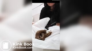 Brunette drops a giant load on a plastic bag