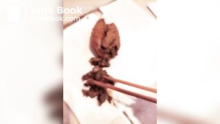 Chinese girl plays with her shit with chopsticks