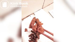 Chinese girl plays with her shit with chopsticks