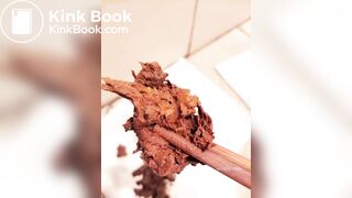 Chinese girl plays with her shit with chopsticks