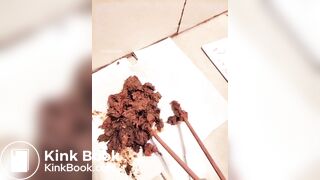 Chinese girl plays with her shit with chopsticks