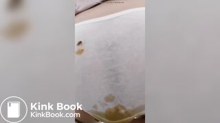 Chinese girl has an enema and poop herself