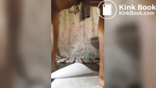 Woman forces out buttplug with a mound of shit