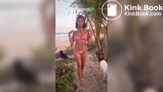 Latina taking a shit in the beach