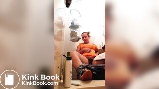 Pooping With Her Feet Up