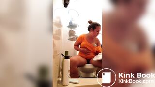 Pooping With Her Feet Up