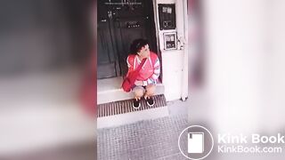 Girl shit in front of a Store