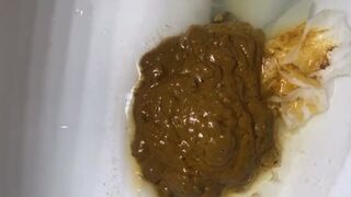 Ebony shitting in toilet - video 2