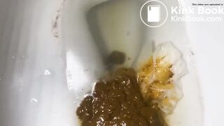 Ebony shitting in toilet - video 2