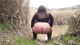 Lady shits in pond