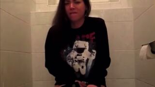 Pooping girl on toilet