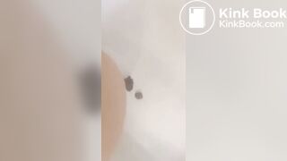 Girl makes mess in bath.