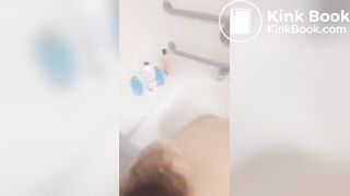 Girl makes mess in bath.