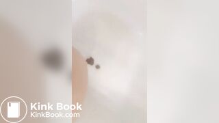 Girl makes mess in bath.