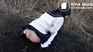 Cute Japanese female student defecates in the wildernes