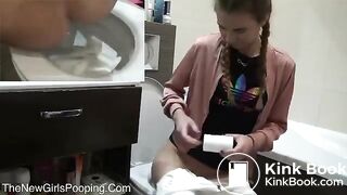 Sarah pooping on toilet