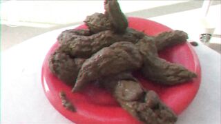 Crazy girl shitting in plate