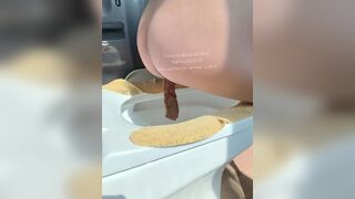 The girl squatted on the toilet to defecate