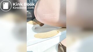 The girl squatted on the toilet to defecate