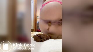 Pissing and pushing out a huge shit